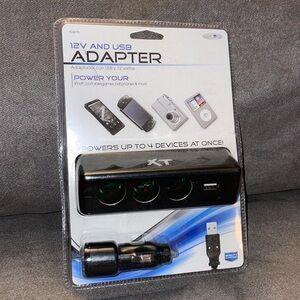 NWT.  12V & USB Adapter.  Powers up to 4 devices at once.